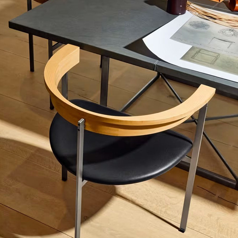 PK11 Armchair by Fritz Hansen, showing pk11 armchair in live shot.