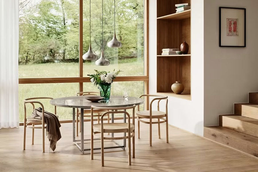 PK15 Chair by Fritz Hansen, showing pk15 chair in live shot.