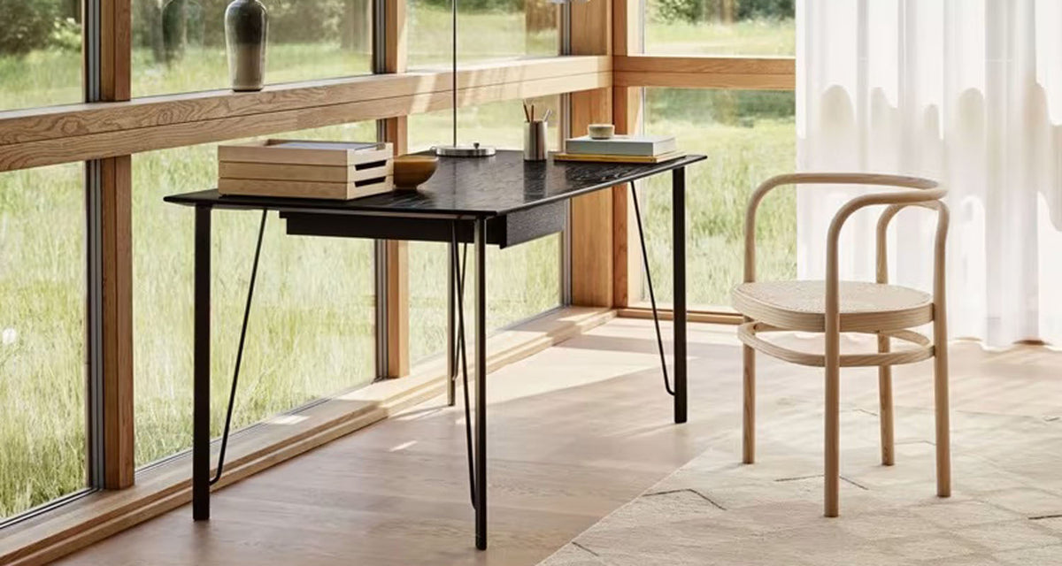 PK15 Chair by Fritz Hansen, showing pk15 chair in live shot.