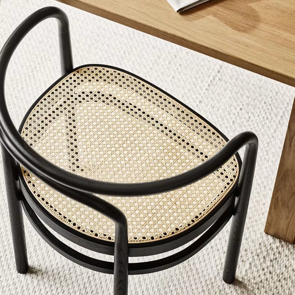 PK15 Chair by Fritz Hansen, showing pk15 chair in live shot.
