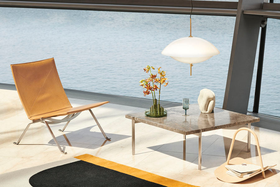 PK22 Lounge Chair by Fritz Hansen, showing pk22 lounge chair in live shot.