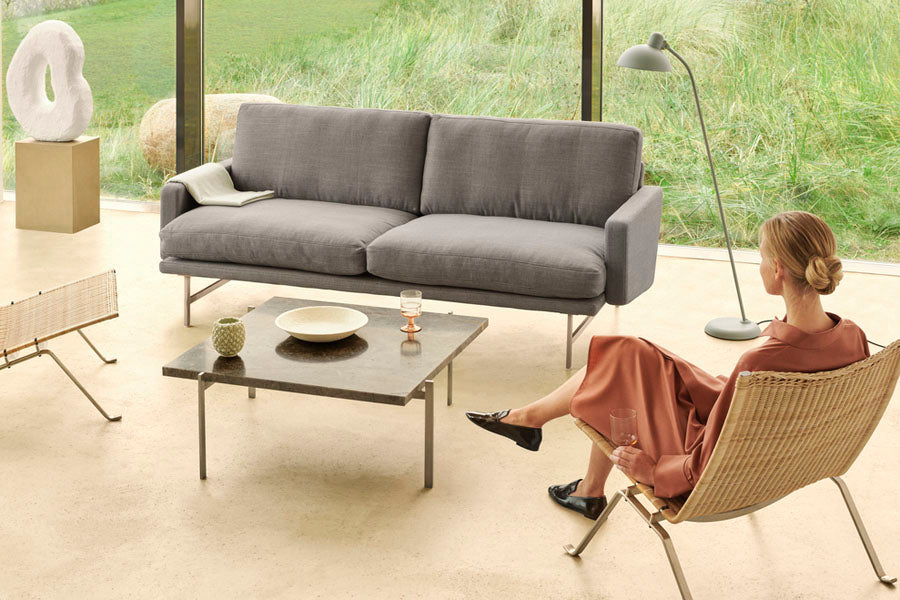 PK22 Lounge Chair by Fritz Hansen, showing pk22 lounge chair in live shot.