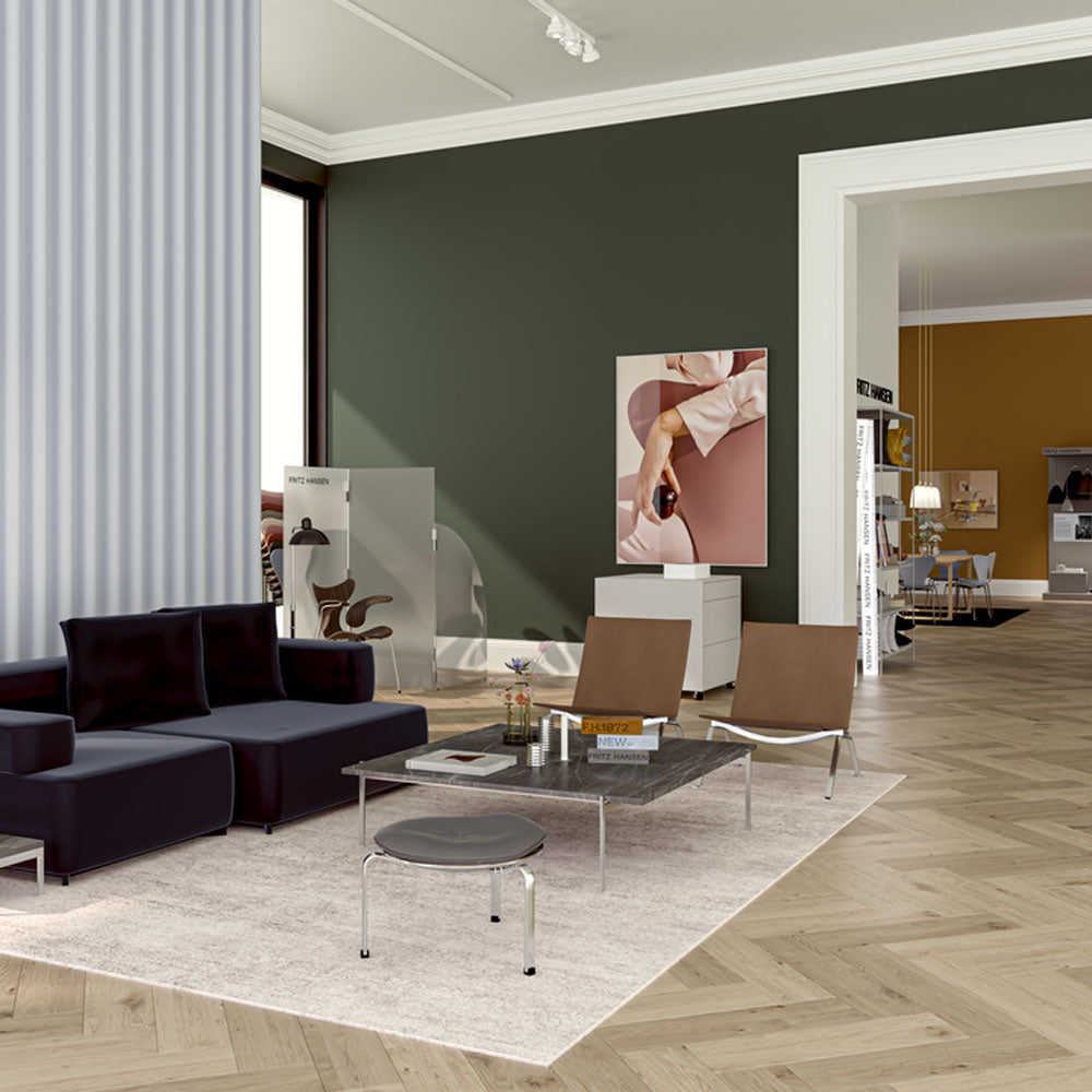 PK22 Lounge Chair by Fritz Hansen, showing pk22 lounge chair in live shot.