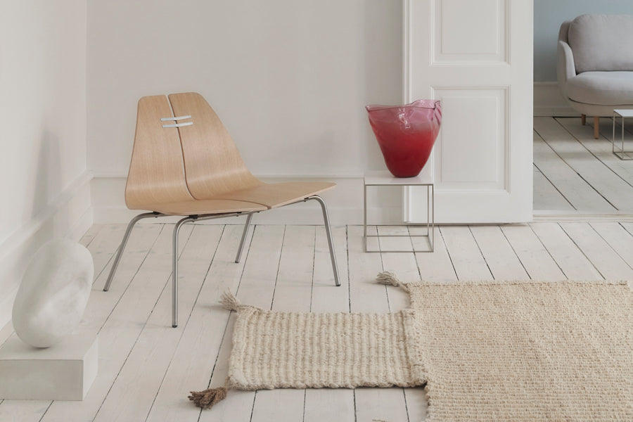 PK23 Lounge Chair by Fritz Hansen, showing pk23 lounge chair in live shot.