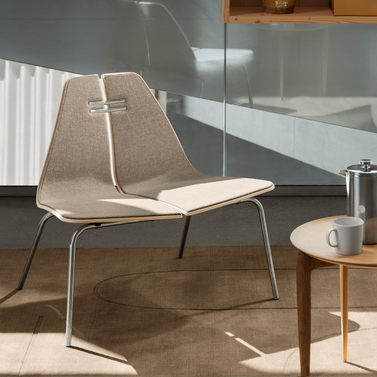 PK23 Lounge Chair by Fritz Hansen, showing pk23 lounge chair in live shot.