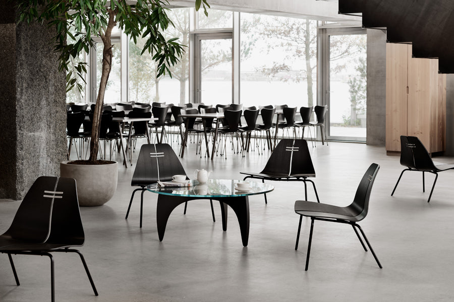 PK23 Lounge Chair by Fritz Hansen, showing pk23 lounge chairs in live shot.