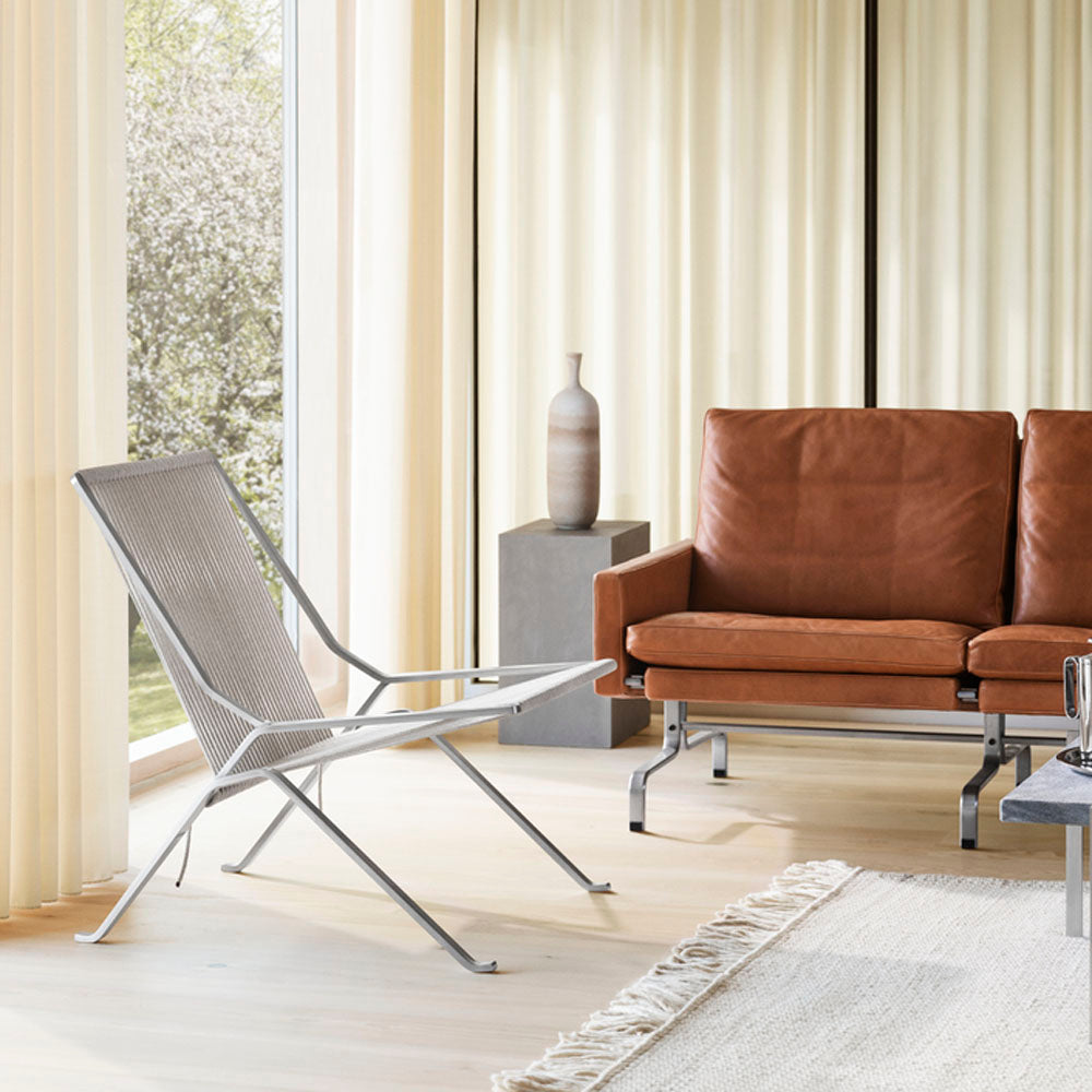 PK25 Lounge Chair by Fritz Hansen, showing pk25 lounge chair in live shot.