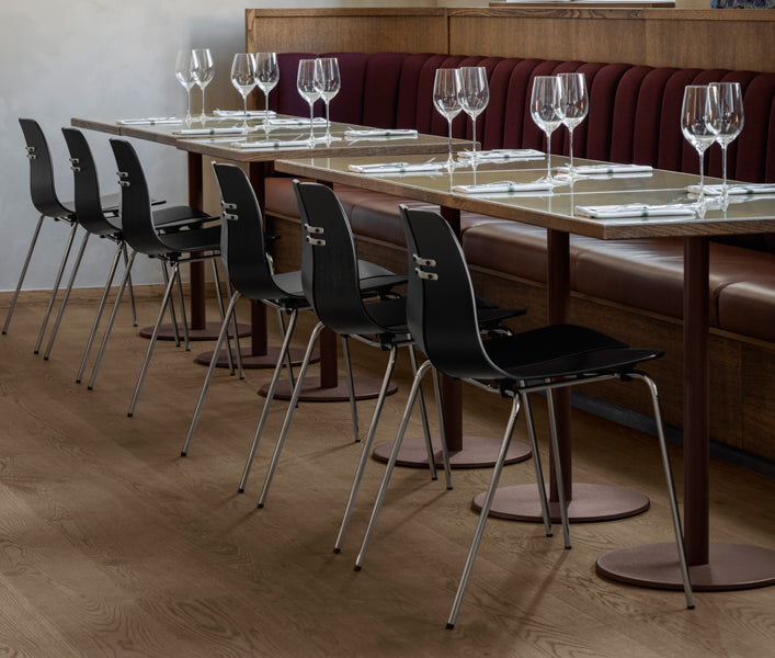 PK3 Chair by Fritz Hansen, showing pk chairs in live shot.