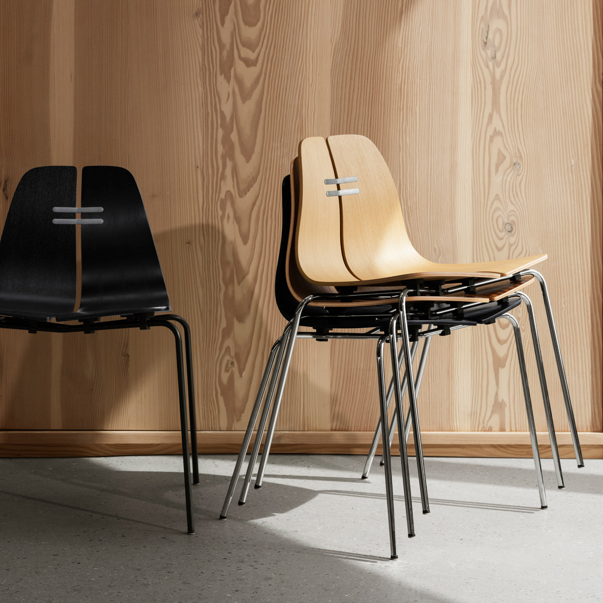 PK3 Chair by Fritz Hansen, showing pk chairs in live shot.