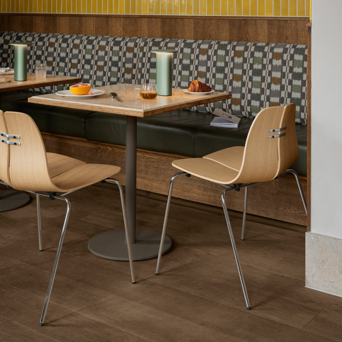 PK3 Chair by Fritz Hansen, showing pk chairs in live shot.