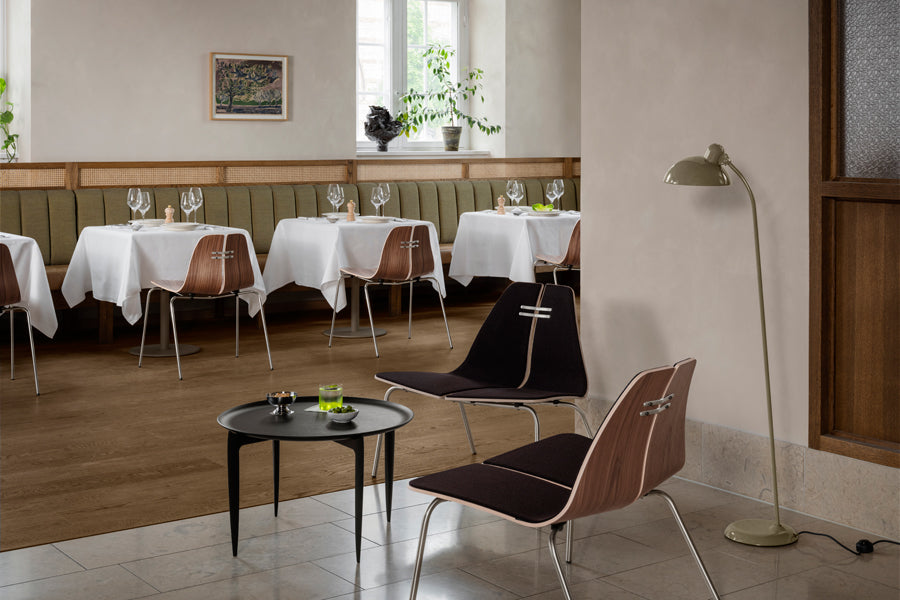 PK3 Chair by Fritz Hansen, showing pk chairs in live shot.