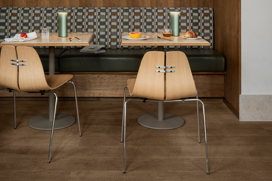 PK3 Chair by Fritz Hansen, showing pk chairs in live shot.