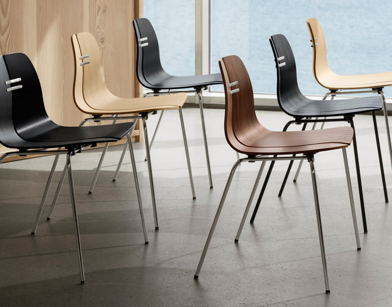 PK3 Chair by Fritz Hansen, showing pk chairs in live shot.