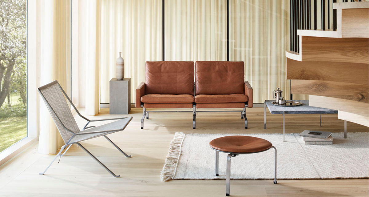 PK31 Sofa by Fritz Hansen, showing pk31 sofa in live shot.