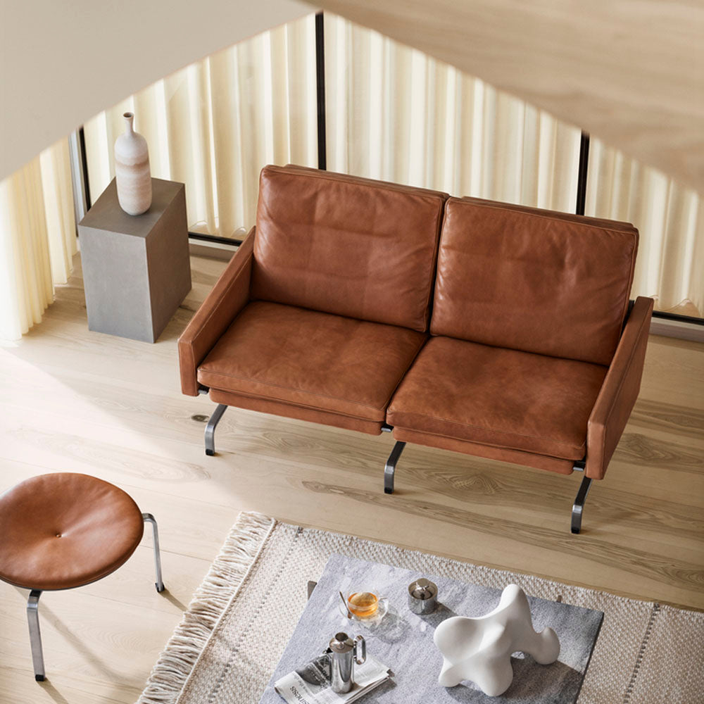 PK31 Sofa by Fritz Hansen, showing pk31 sofa in live shot.