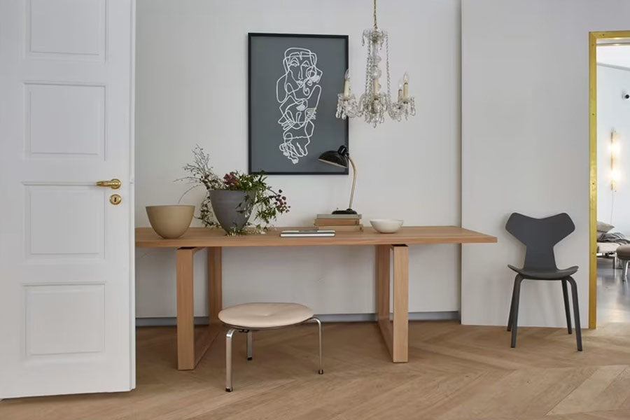 PK33 Stool by Fritz Hansen, showing pk33 stool in live shot.