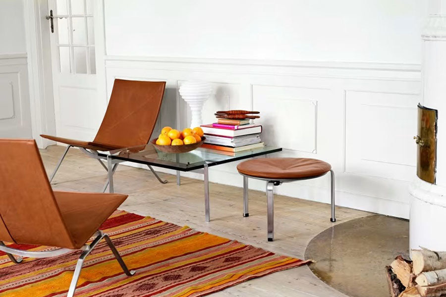PK33 Stool by Fritz Hansen, showing pk33 stool in live shot.