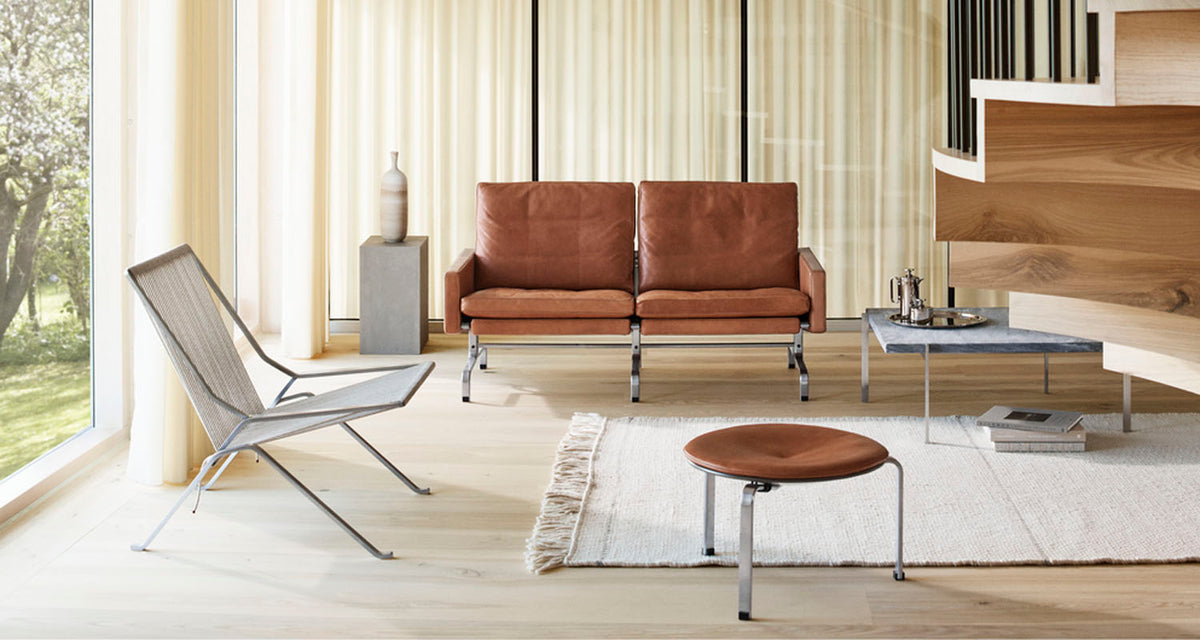 PK33 Stool by Fritz Hansen, showing pk33 stool in live shot.