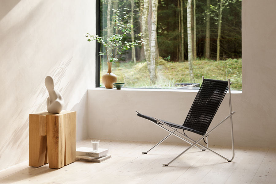 PK4 Lounge Chair by Fritz Hansen, showing pk4 lounge chair in live shot.