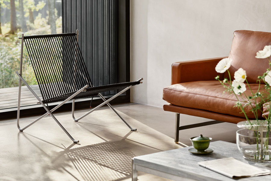 PK4 Lounge Chair by Fritz Hansen, showing pk4 lounge chair in live shot.