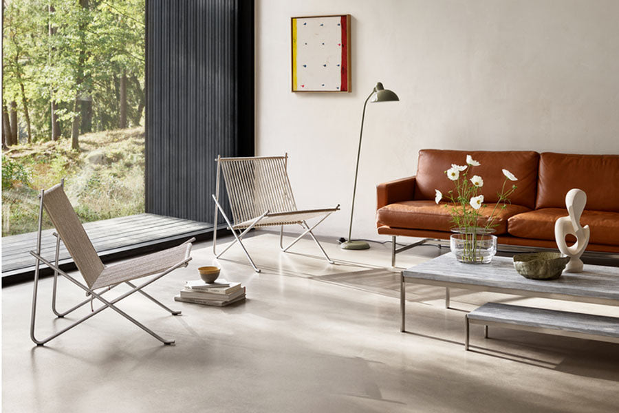 PK4 Lounge Chair by Fritz Hansen, showing pk4 lounge chair in live shot.
