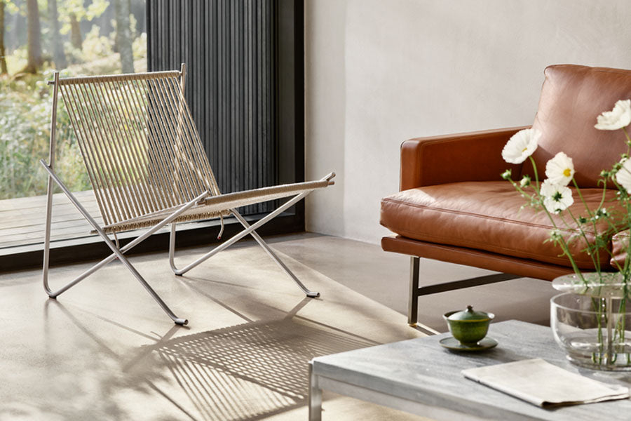 PK4 Lounge Chair by Fritz Hansen, showing pk4 lounge chair in live shot.