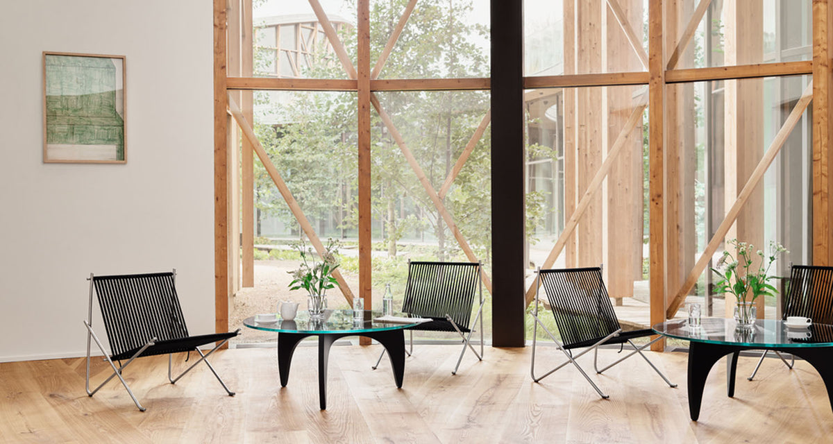 PK4 Lounge Chair by Fritz Hansen, showing pk4 lounge chair in live shot.