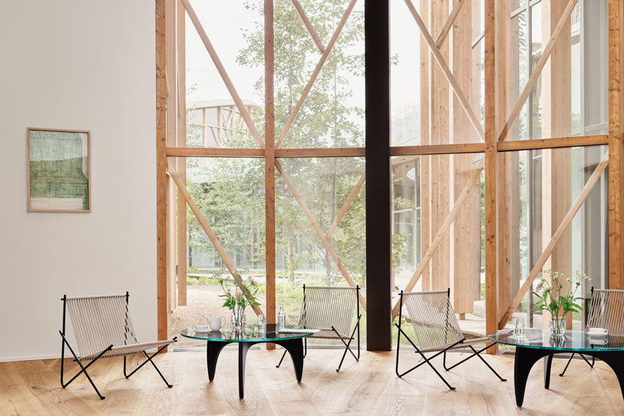 PK60 Coffee Table by Fritz Hansen, showing pk60 coffee table in live shot.