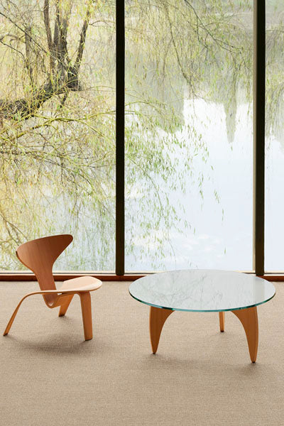 PK60 Coffee Table by Fritz Hansen, showing pk60 coffee table in live shot.