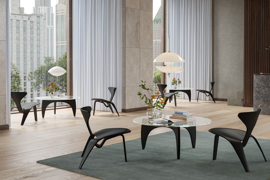 PK60 Coffee Table by Fritz Hansen, showing pk60 coffee table in live shot.