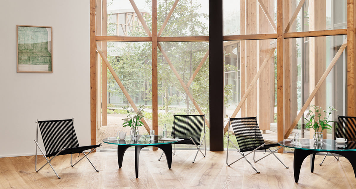 PK60 Coffee Table by Fritz Hansen, showing pk60 coffee table in live shot.