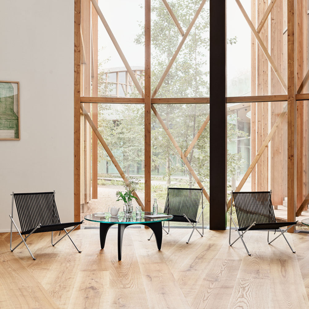 PK60 Coffee Table by Fritz Hansen, showing pk60 coffee table in live shot.