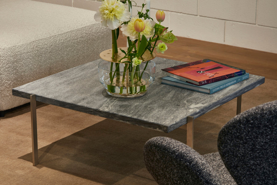 PK61 Coffee Table by Fritz Hansen, showing pk61 coffee table in live shot.