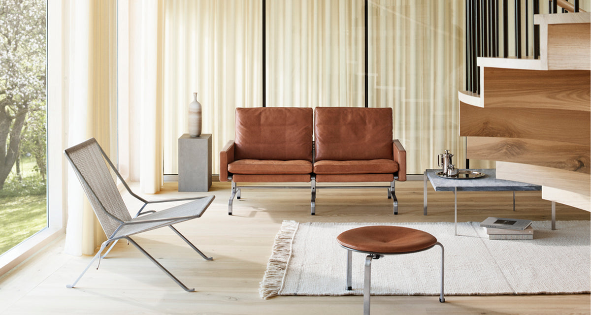 PK61 Coffee Table by Fritz Hansen, showing pk61 coffee table in live shot.