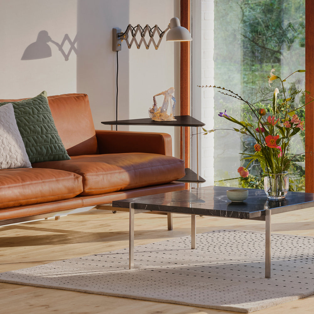 PK61 Coffee Table by Fritz Hansen, showing pk61 coffee table in live shot.