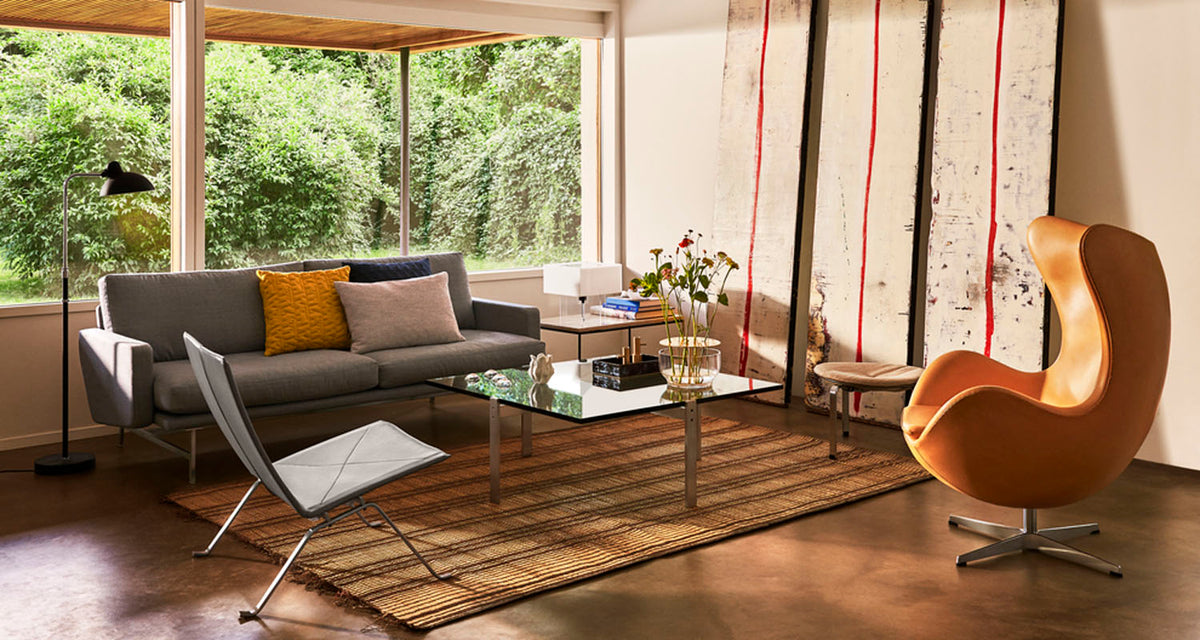 PK65 Coffee Table by Fritz Hansen, showing pk65 coffee table in live shot.