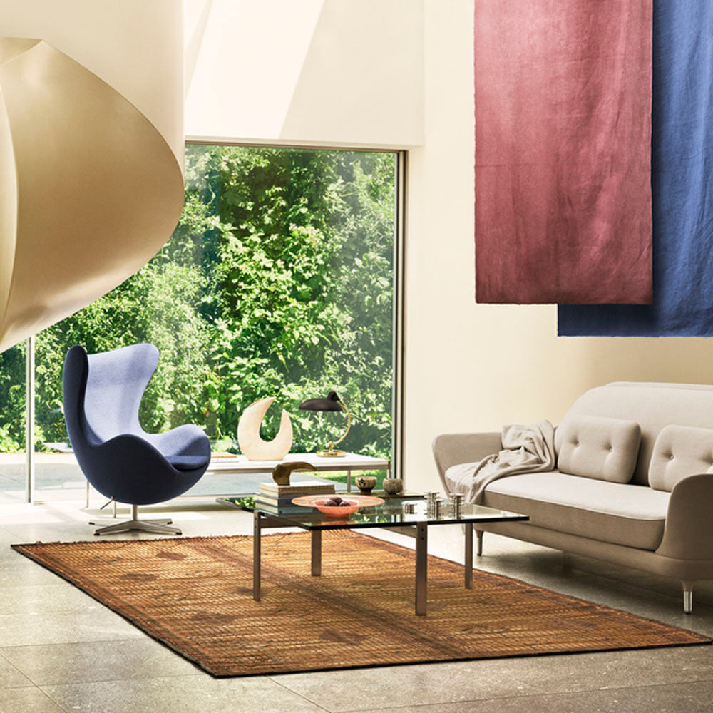 PK65 Coffee Table by Fritz Hansen, showing pk65 coffee table in live shot.