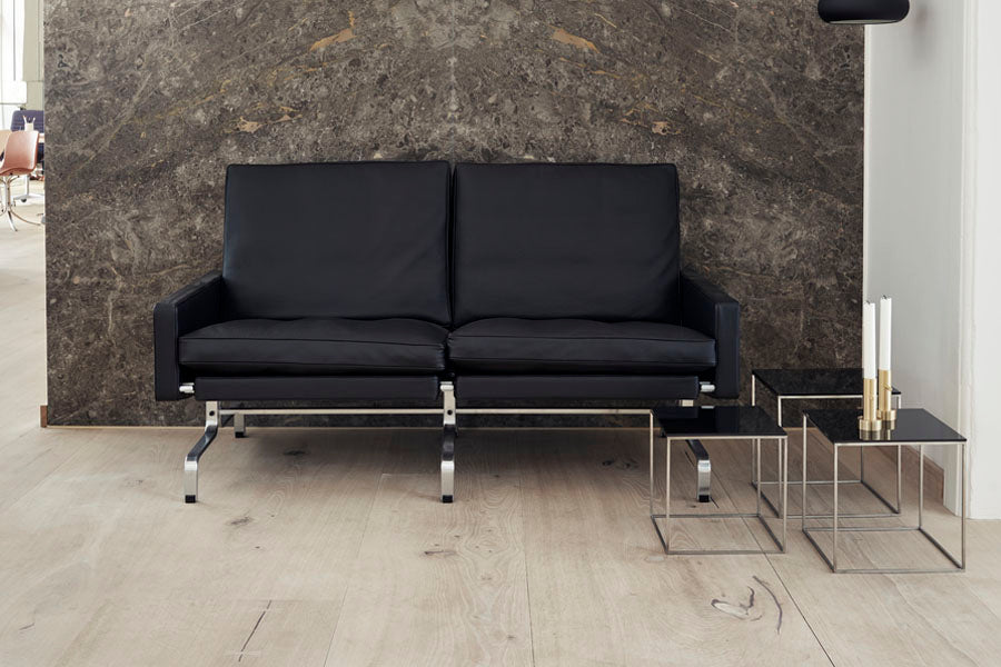 PK71 Nesting Table by Fritz Hansen, showing pk71 nesting table in live shot.