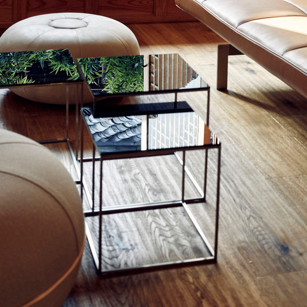 PK71 Nesting Table by Fritz Hansen, showing pk71 nesting table in live shot.