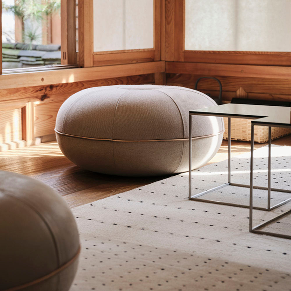 PK71 Nesting Table by Fritz Hansen, showing pk71 nesting table in live shot.