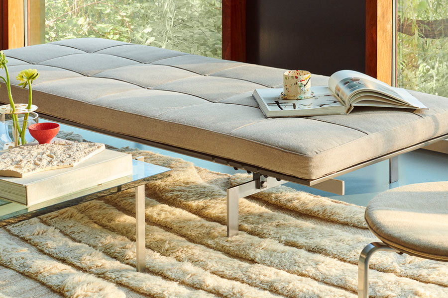PK80 Daybed by Fritz Hansen, showing pk80 daybed in live shot.
