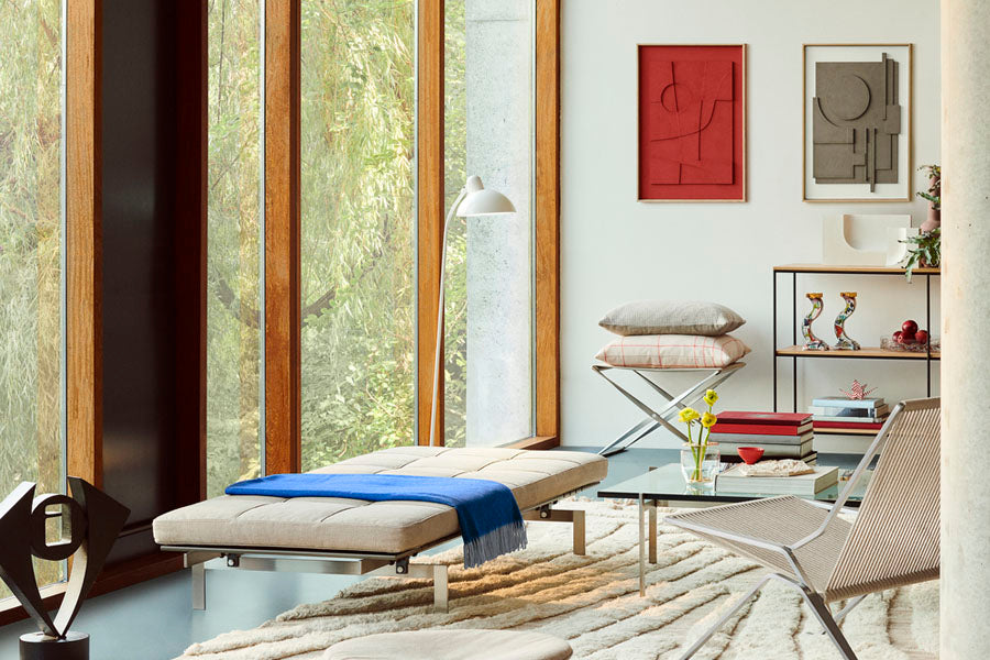 PK80 Daybed by Fritz Hansen, showing pk80 daybed in live shot.