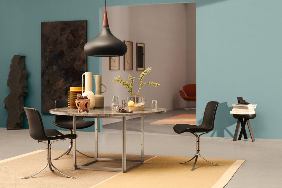 PK9 Chair by Fritz Hansen, showing pk9 chair in live shot.