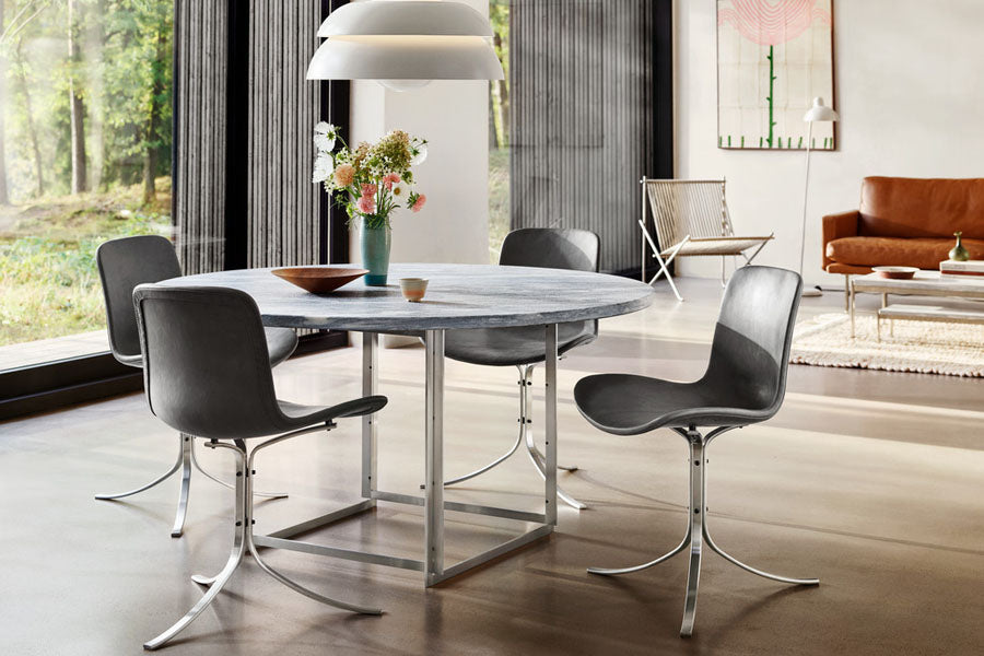 PK9 Chair by Fritz Hansen, showing pk9 chair in live shot.