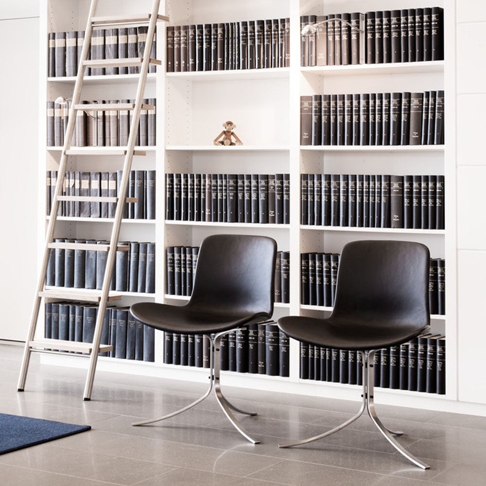 PK9 Chair by Fritz Hansen, showing pk9 chair in live shot.