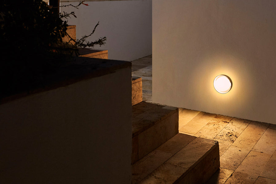Plaff-On IP54 Wall/Ceiling Lamp by Marset, showing plaff-on ip54 wall/ceiling lamp in live shot.