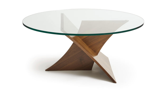 Planes Coffee Table by Copeland Furniture, showing side view of planes coffee table in natural walnut/clear glass.