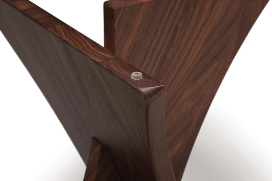 Planes End Table by Copeland Furniture, showing closeup view of planes end table in natural walnut/clear glass.