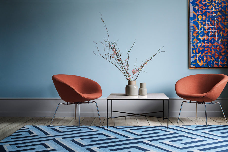 Planner Coffee Table by Fritz Hansen, showing planner coffee table in live shot.
