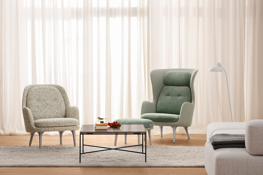 Planner Coffee Table by Fritz Hansen, showing planner coffee table in live shot.